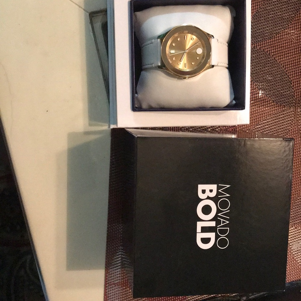 Gold and white Movado Watch